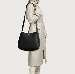 Salvatore Ferragamo-Gancini reverse grainy leather hobo shoulder bag in Black